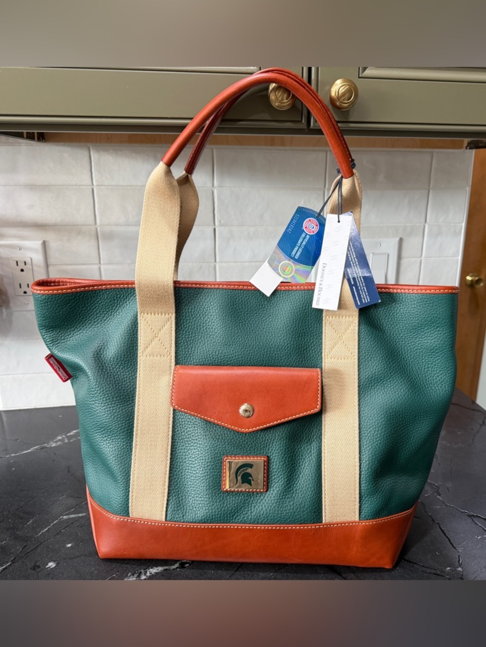 Dooney & Bourke MSU Green Tote with Tan Straps and Brown Leather Trim